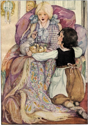 Clara had the kittens on her lap, and Heidi was kneeling beside her.